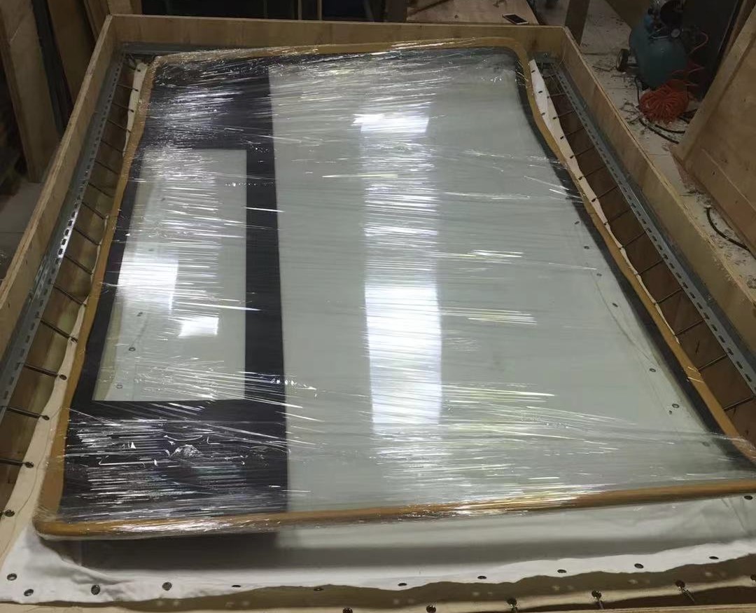 大型鋼化玻璃出口到尼泊爾,彈簧蹦床包裝方案——一次危險品進出口包裝方案的飛躍！